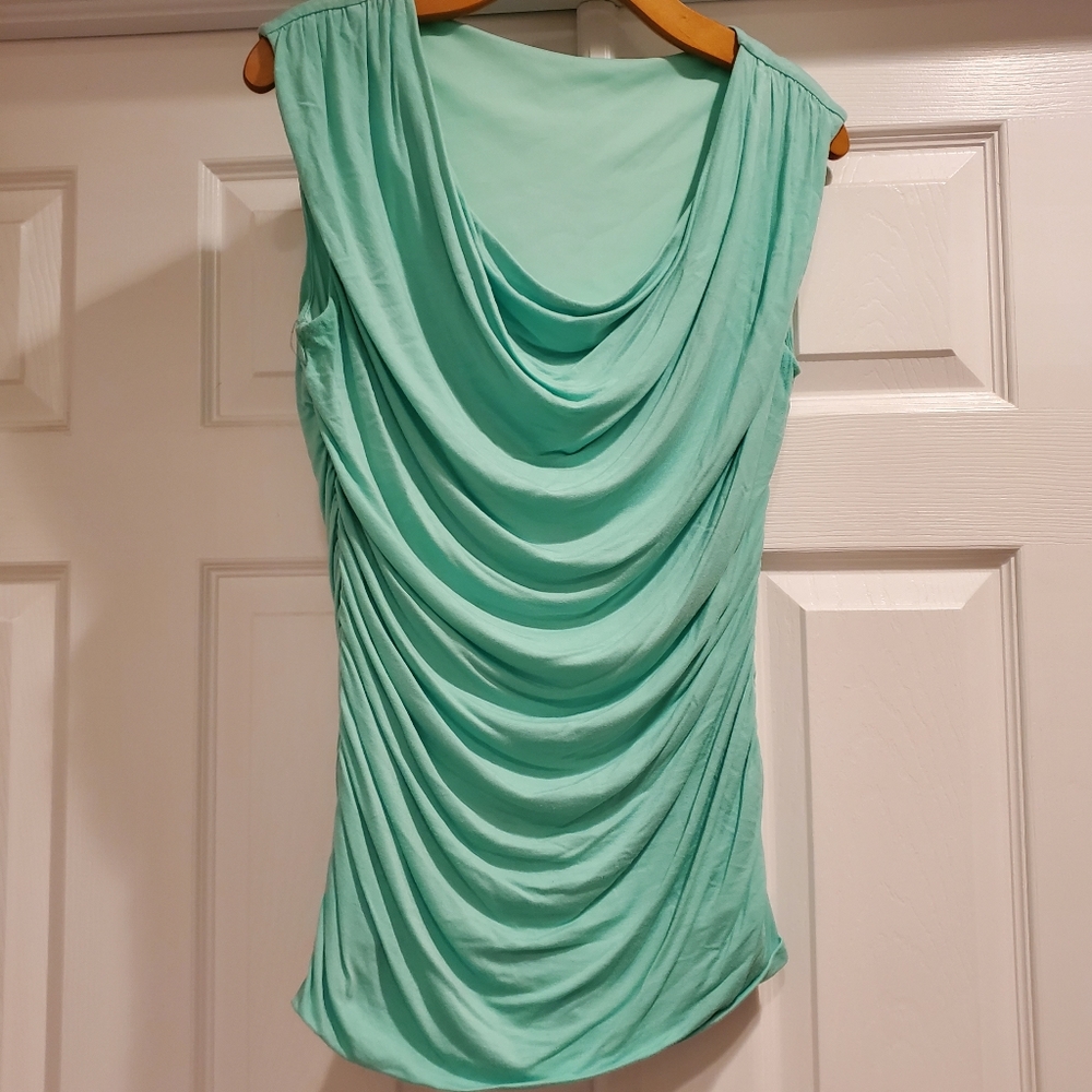 Cowl neck/rouched sleeveless top.